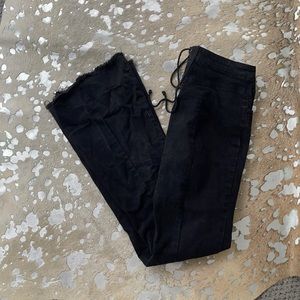 High waisted flare black jeans with tie detail